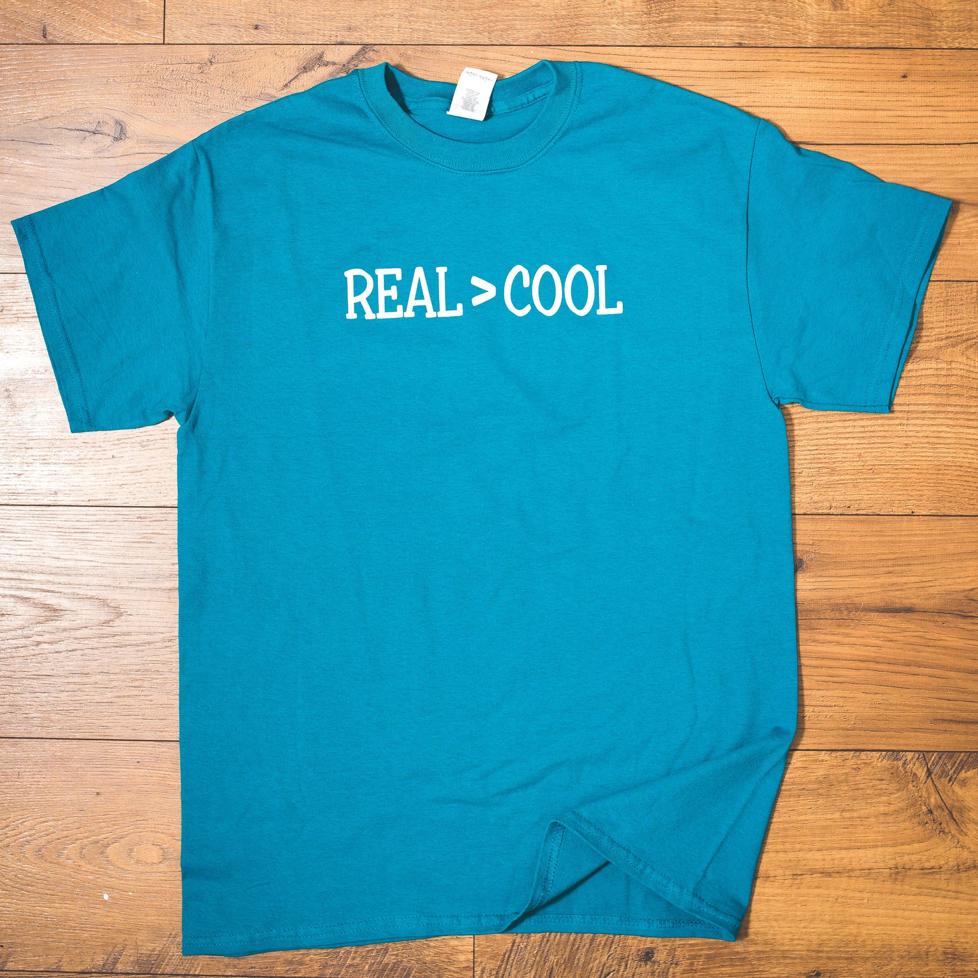Real > Cool Crew T Shirt - Meet The Curator: The Boutique